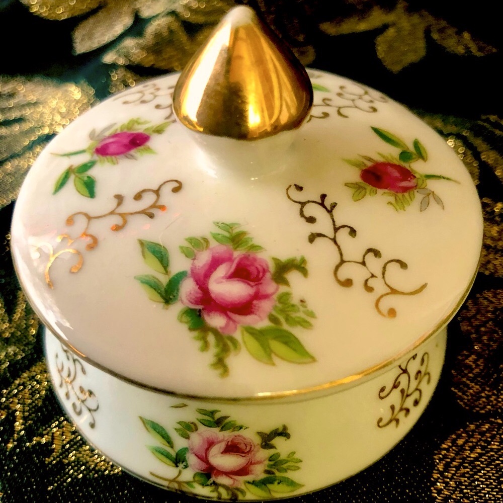 Vintage Hand Painted Porcelain Trinket Box.  Contents in photo sold separately.